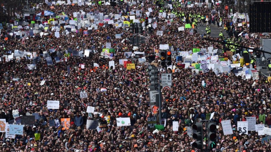People+from+all+around+America+gather+together+in+support+of+tighter+gun+control+to+prevent+another+incident+along+the+lines+of+the+Parkland+shooting.+