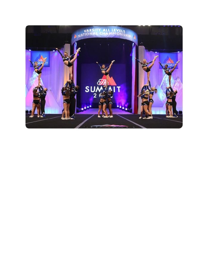 Cheerleaders hard work shows as they hit  their stunts perfectly at Summit Nationals.  