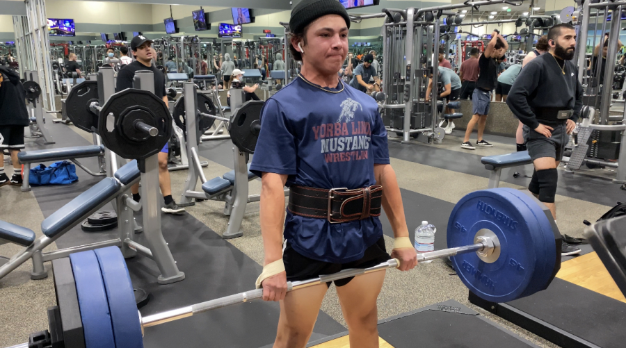Eighth grader Cole Nerio uses power lifting to get into better physical and mental health.